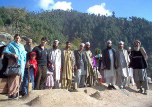 Dr. Omar Elahi and his team in the mountains with an affected family. 