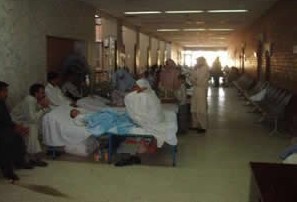 Patient beds line the halls of the hospitals in Islamabad and Rawalpindi.