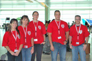 CMAT Primary Health Care Team 2 awaiting departure at Toronto's Pearson Airport: L-R Zarena Pash, RN; Denise Reimer, PCP; Jennifer Pritchard, Medical Resident; Drew Dorssers, PCP; Mark Crandall, RN. (absent: Lorren Locke and Kari Locke, RN).