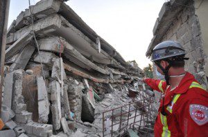 CMAT Paramedic Ryan Thorburn assesses the earthquake damage in some of the buildings in Port au Prince, Haiti. 