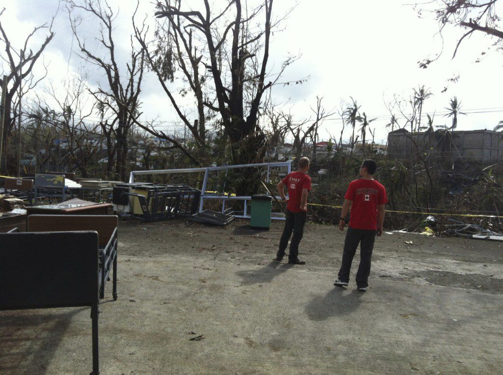 CMAT Assessment Team members Martin Metz and Marty Quintia assess the infrastructure damage in Ormoc, Leyte. 