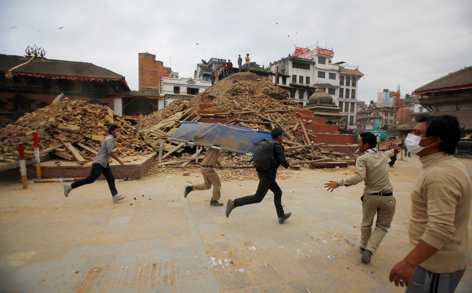 Rescuers rush to help victims of the devestating earthquake in Nepal - April 25, 2015