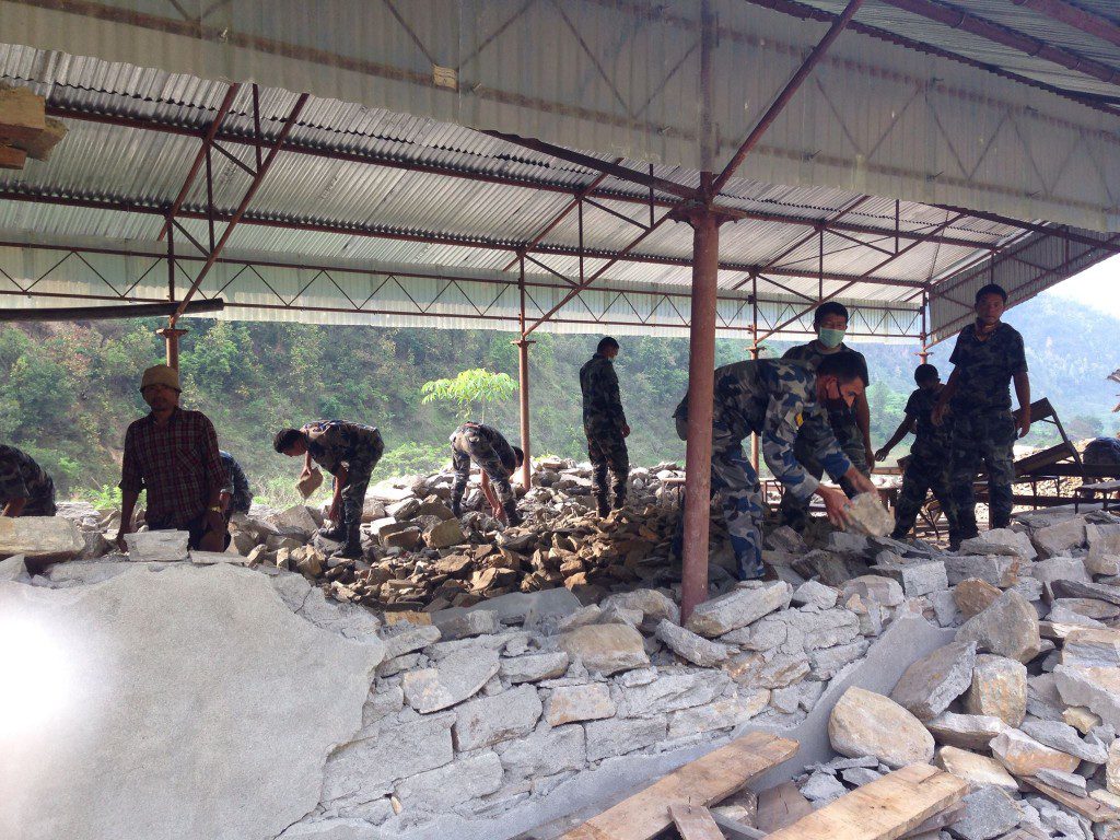 Nepali soldiers have arrived in Baluwa to help reconstruct the school adjacent to where CMAT team members are camping. 