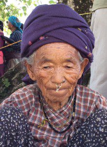 Elderly woman waiting to be assessed in the CMAT clinic in Takukot. 