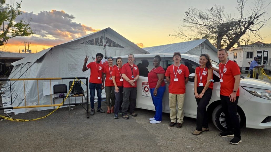 CMAT Team members in front of the EMT type 1 in Montego Bay on Day 1 of clinic